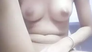 Sweet nude Indian girl fingering pussy