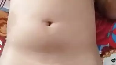 XXX model with natural breasts loves lying in bed with naked muff