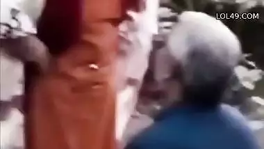 Uncle sucking aunty boobs while walking in park