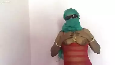 Indian mom sucking a dildo and sticking it in her XXX pussy