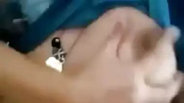 Naughty Desi minx lifts up shirt and shows her natural XXX breasts