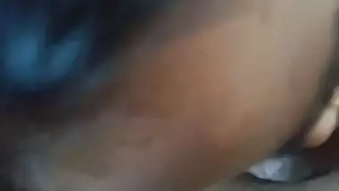 Semi-nude maid sucking dick like a pro