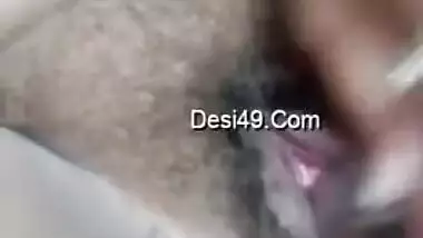 Fat Indian aunty fucks her own hairy twat with the new sex toy
