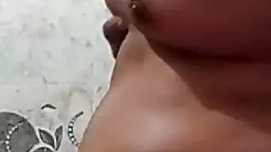 Desi Horny Babe playing with her Bouncy Tits
