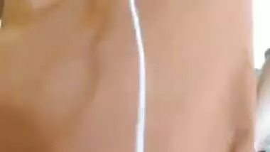 Desi housewife takes clothes off till she is naked in solo XXX video