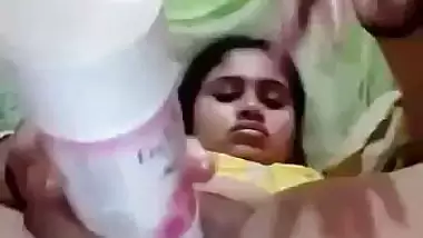 Desi babe using room freshener bottle to masturbate
