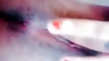 Lovely Desi teen moans while fingering own wet XXX vagina at home