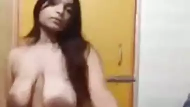 Desi wench demonstrates her big sexy XXX tits and touches hairy twat