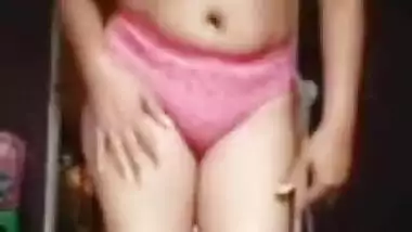 Hot desi girl showing her boobs and fingering pussy