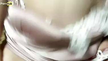 Stepmother and stepson share a bed in a hotel room.