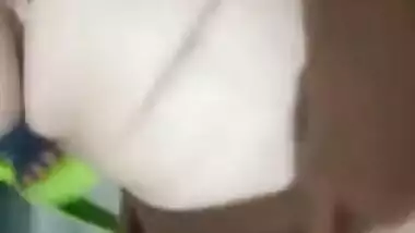 Desi girl makes solo XXX video of herself stripping down under the fan