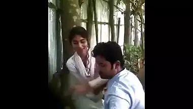 Hidden cam catches a horny college girl kissing and having outdoor fun