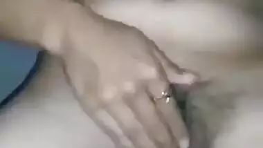 Sexy desi girl showing her boobs and fingering pussy