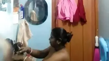 Indian whore closes the door and starts daily XXX striptease home